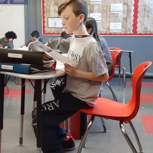 Robert LeRoux on the edge of his seat during ELA (1)